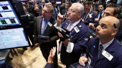 Markets slide on worries of credit tightening in U.S., China