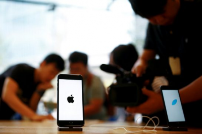 You love your iPhone. But should you invest in Apple?